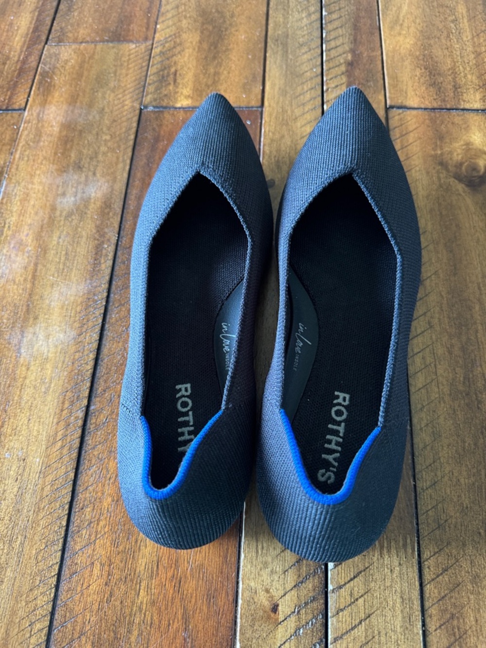 Rothy's Like New Black Pointed Toe Flats with Blue Heel Trim